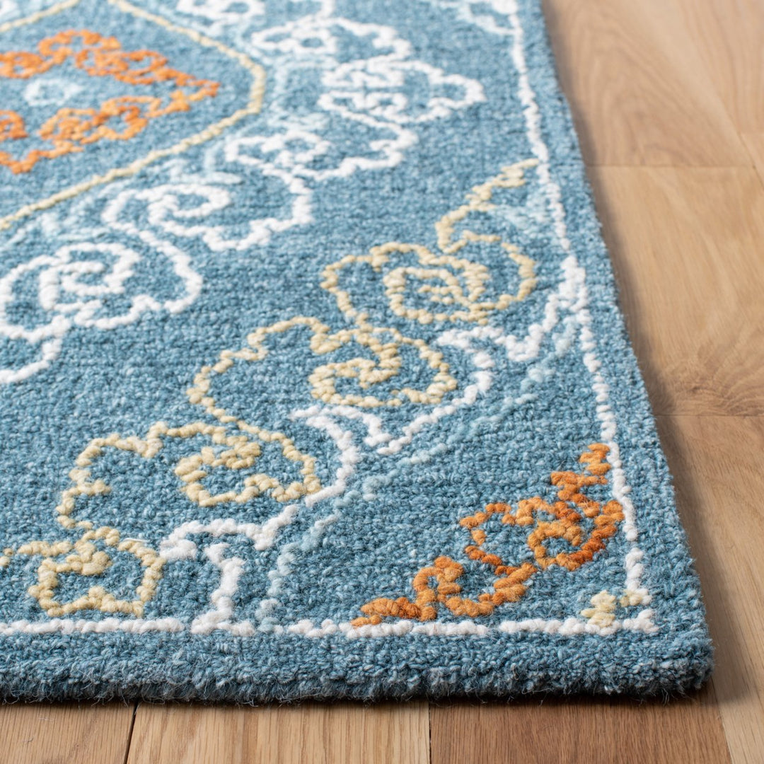 SAFAVIEH Blossom BLM606M Handmade Blue / Yellow Rug Image 6