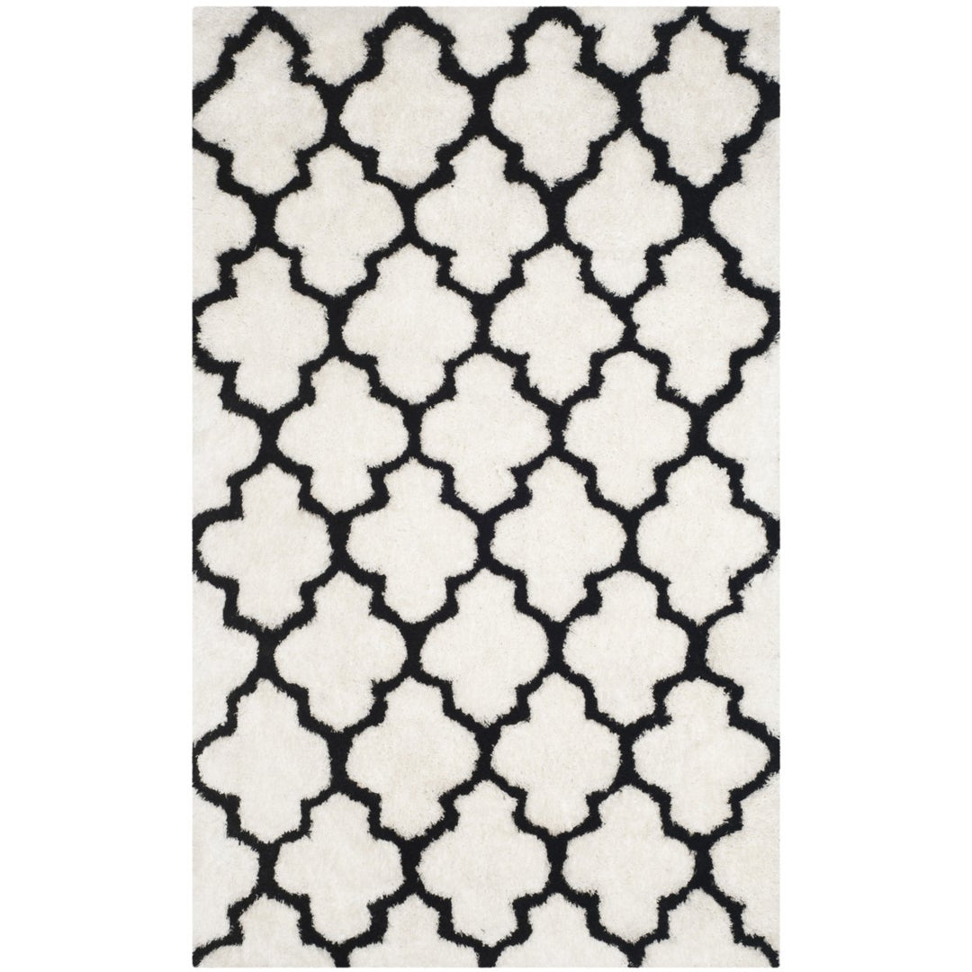 SAFAVIEH Barcelona Shag BSG319C Handmade Ivory /Black Rug Image 1