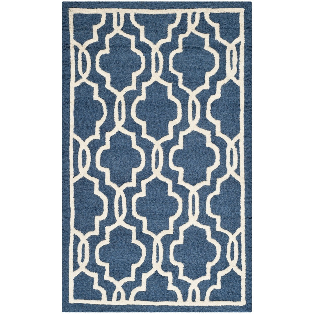 SAFAVIEH Cambridge CAM131G Handmade Navy / Ivory Rug Image 1