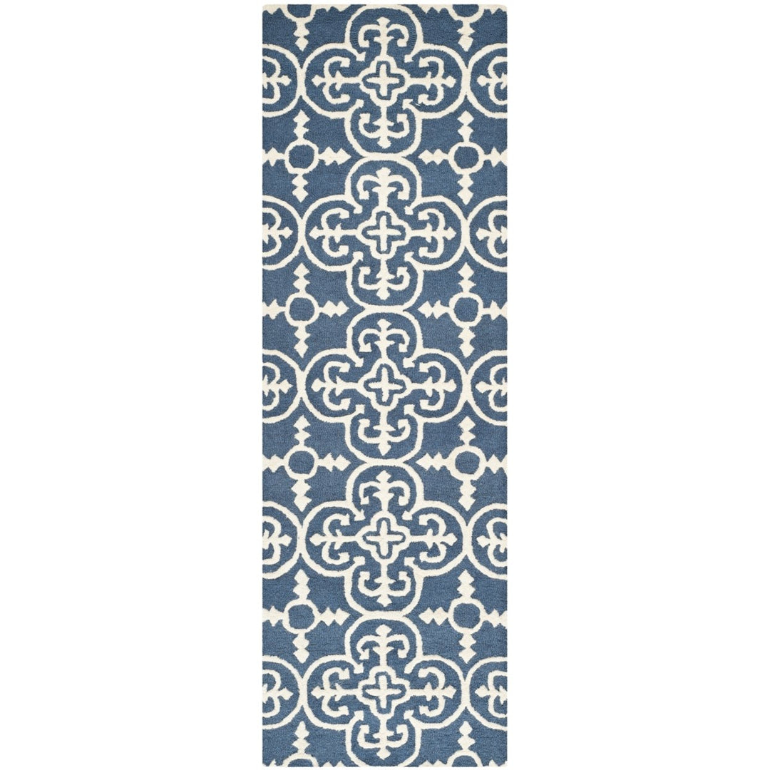 SAFAVIEH Cambridge CAM133G Handmade Navy / Ivory Rug Image 1