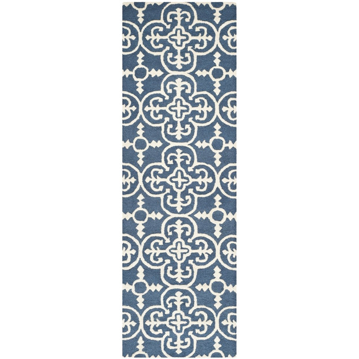 SAFAVIEH Cambridge CAM133G Handmade Navy / Ivory Rug Image 1