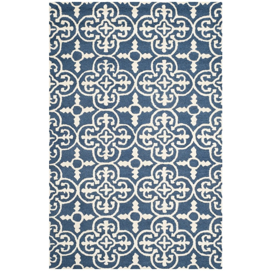 SAFAVIEH Cambridge CAM133G Handmade Navy / Ivory Rug Image 1