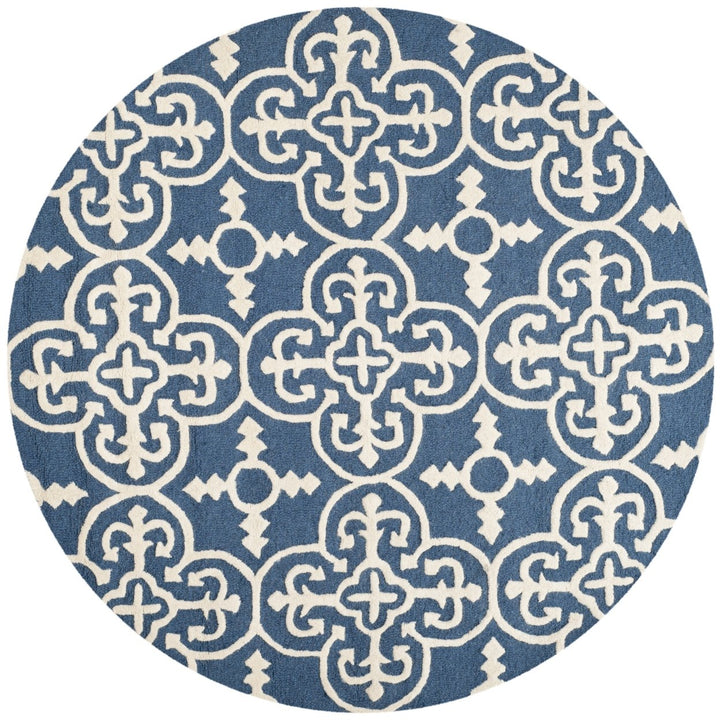 SAFAVIEH Cambridge CAM133G Handmade Navy / Ivory Rug Image 1