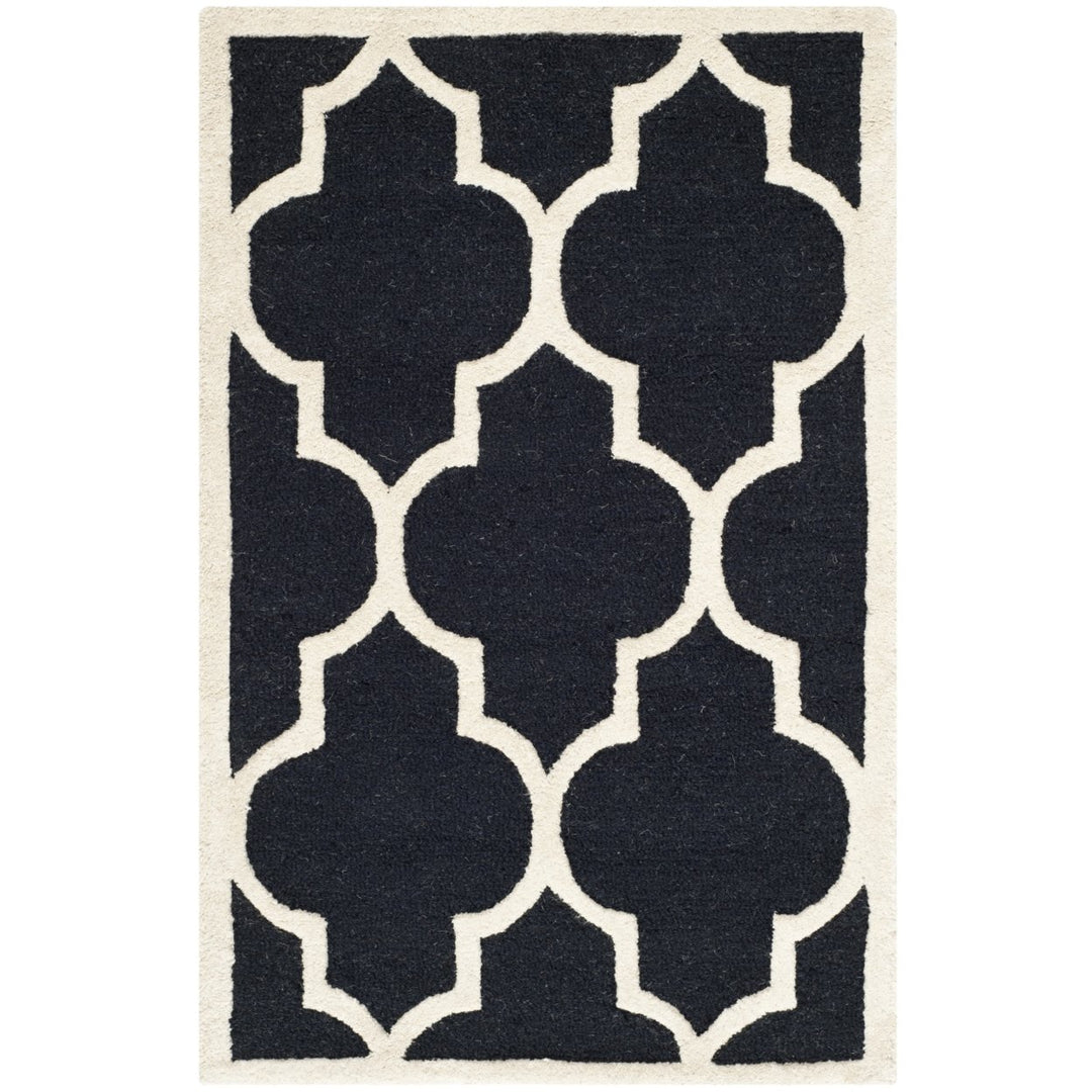 SAFAVIEH Cambridge CAM134E Handmade Black / Ivory Rug Image 1