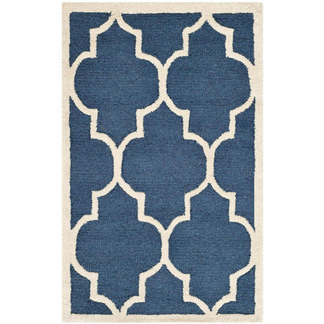 SAFAVIEH Cambridge CAM134G Handmade Navy / Ivory Rug Image 1