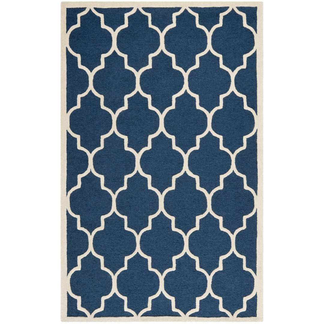 SAFAVIEH Cambridge CAM134G Handmade Navy / Ivory Rug Image 1