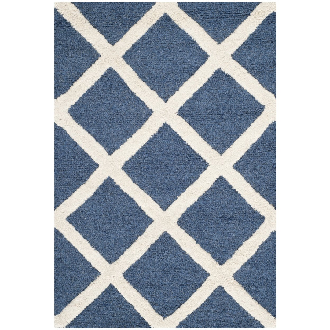 SAFAVIEH Cambridge CAM135G Handmade Navy / Ivory Rug Image 1