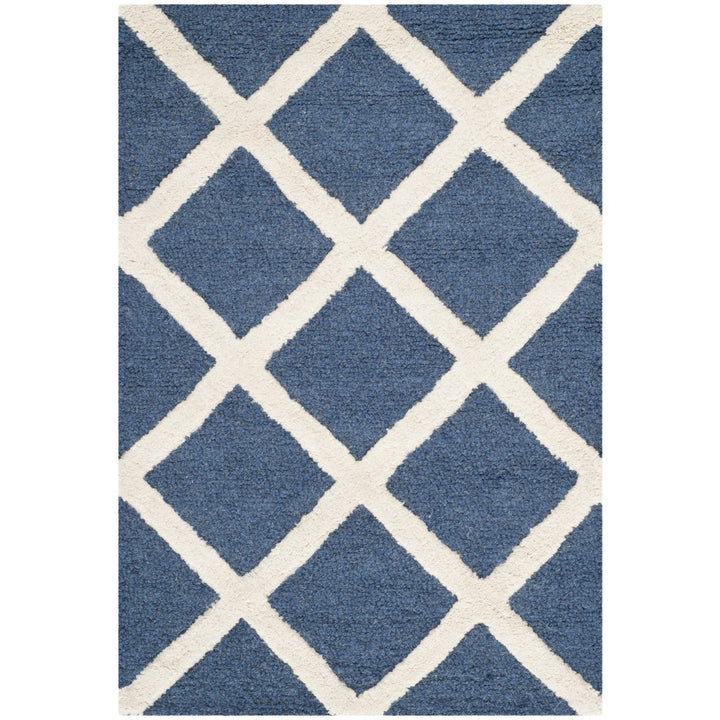 SAFAVIEH Cambridge CAM135G Handmade Navy / Ivory Rug Image 1