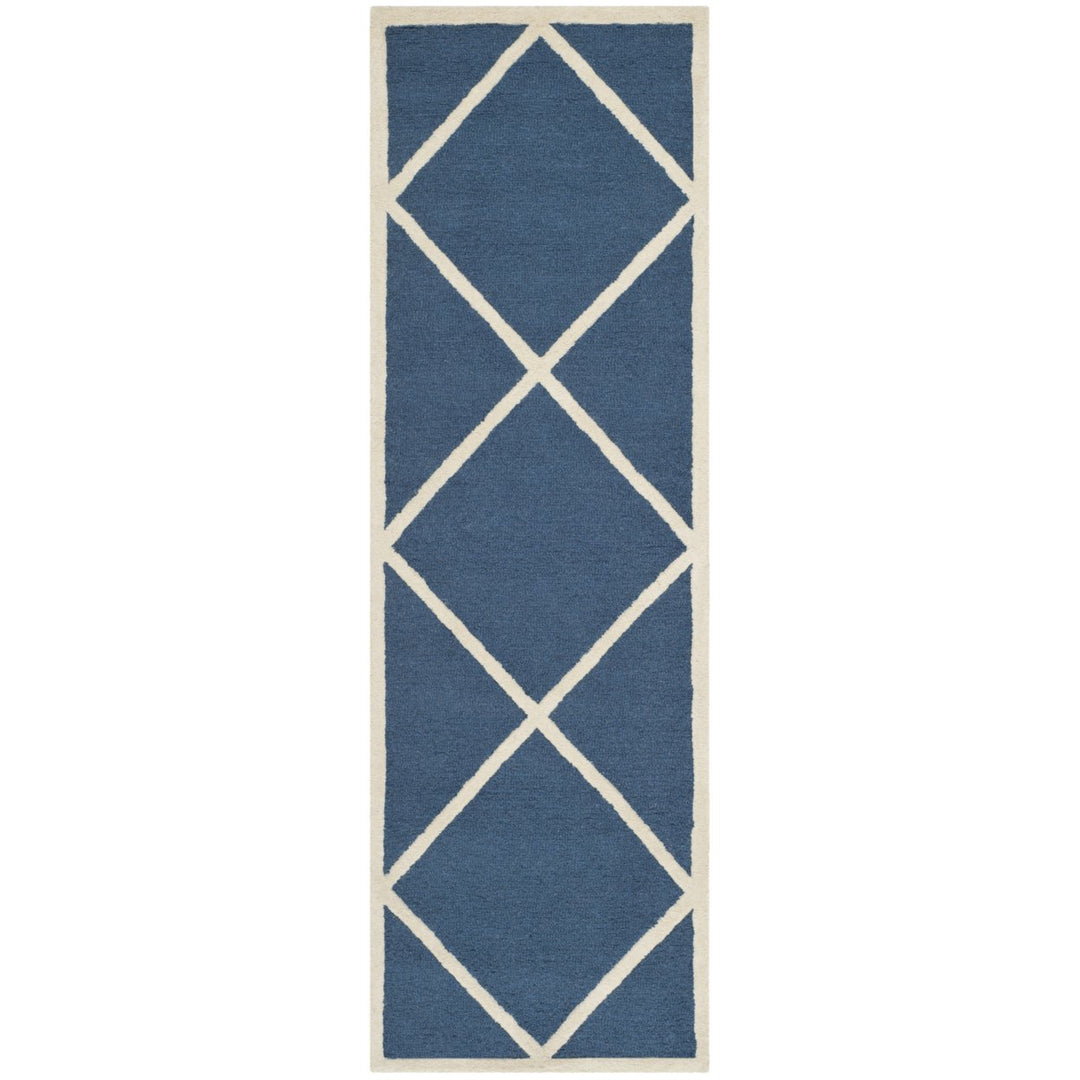 SAFAVIEH Cambridge CAM136G Handmade Navy / Ivory Rug Image 1