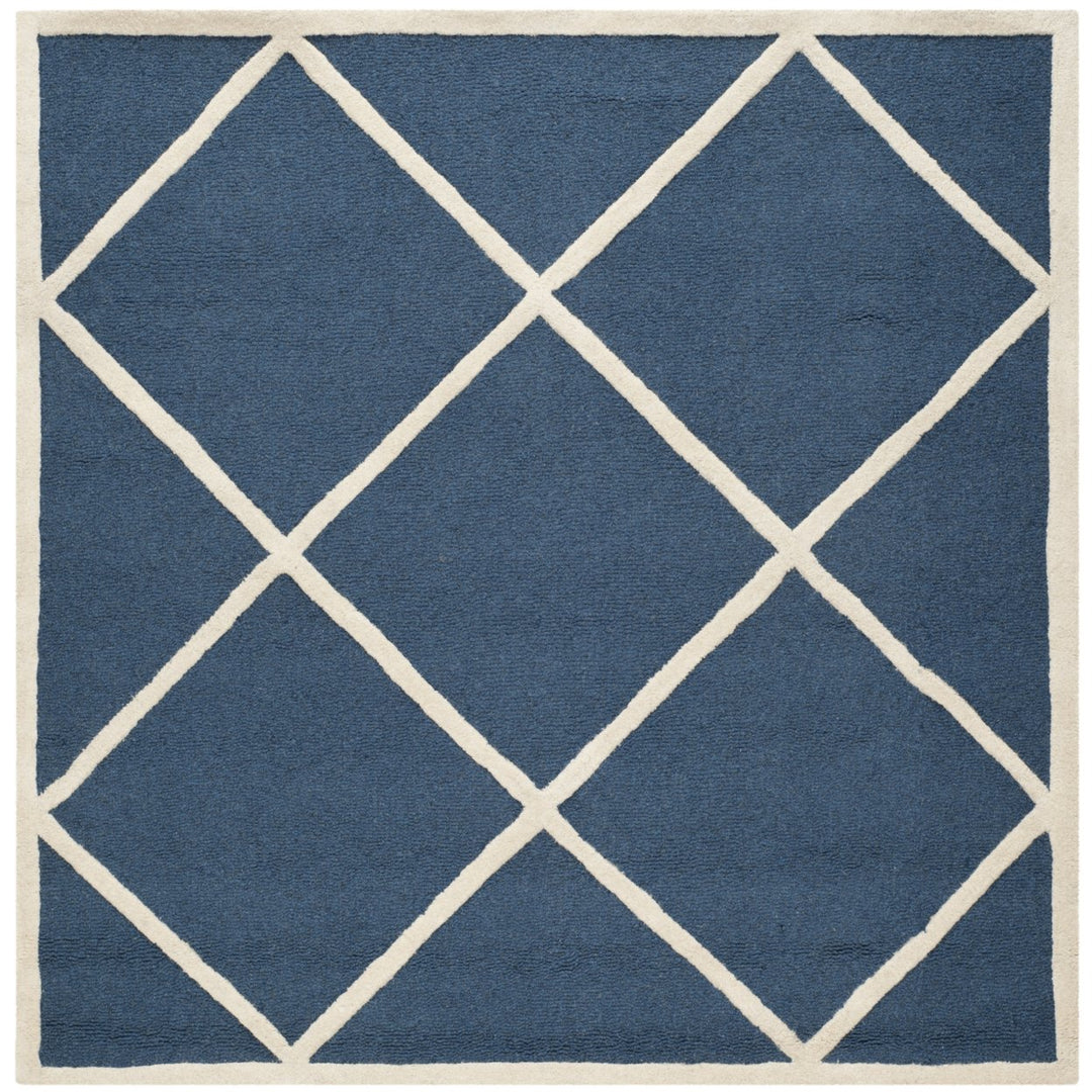 SAFAVIEH Cambridge CAM136G Handmade Navy / Ivory Rug Image 1