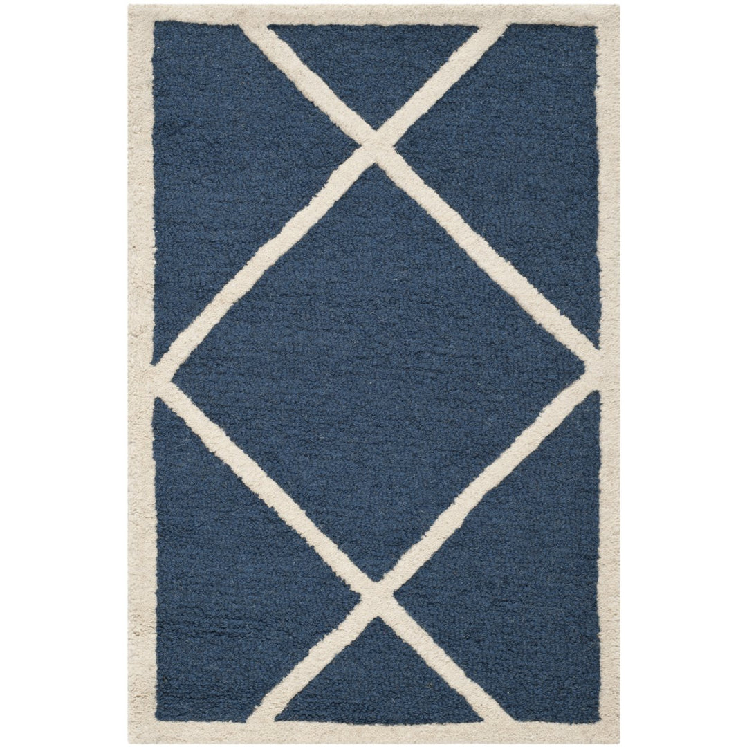 SAFAVIEH Cambridge CAM136G Handmade Navy / Ivory Rug Image 1