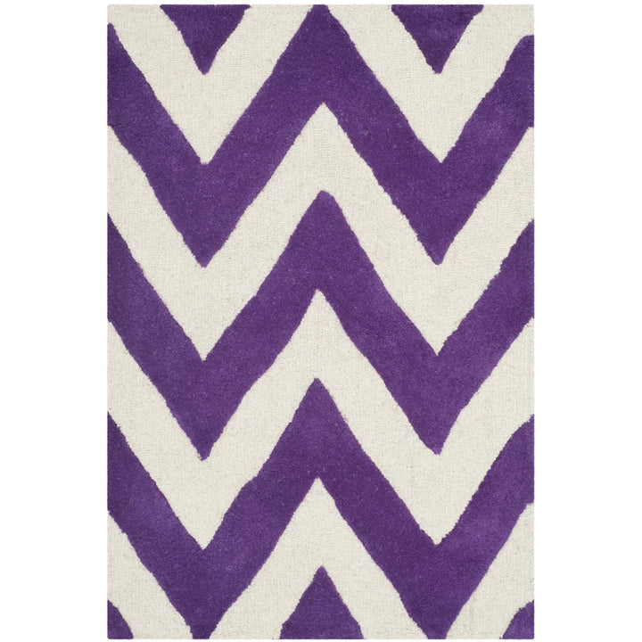 SAFAVIEH Cambridge CAM139K Handmade Purple /Ivory Rug Image 1