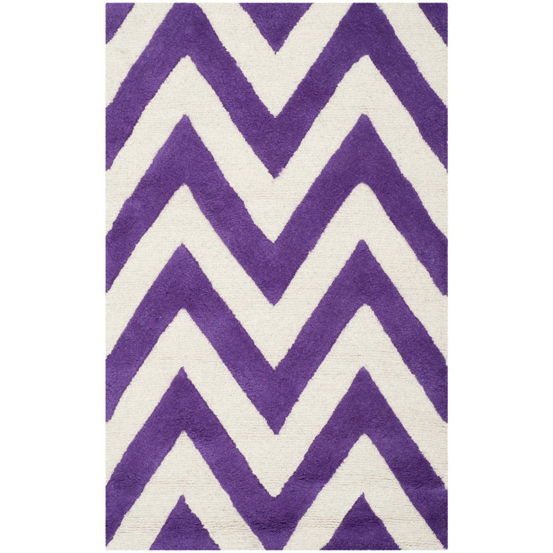 SAFAVIEH Cambridge CAM139K Handmade Purple /Ivory Rug Image 1