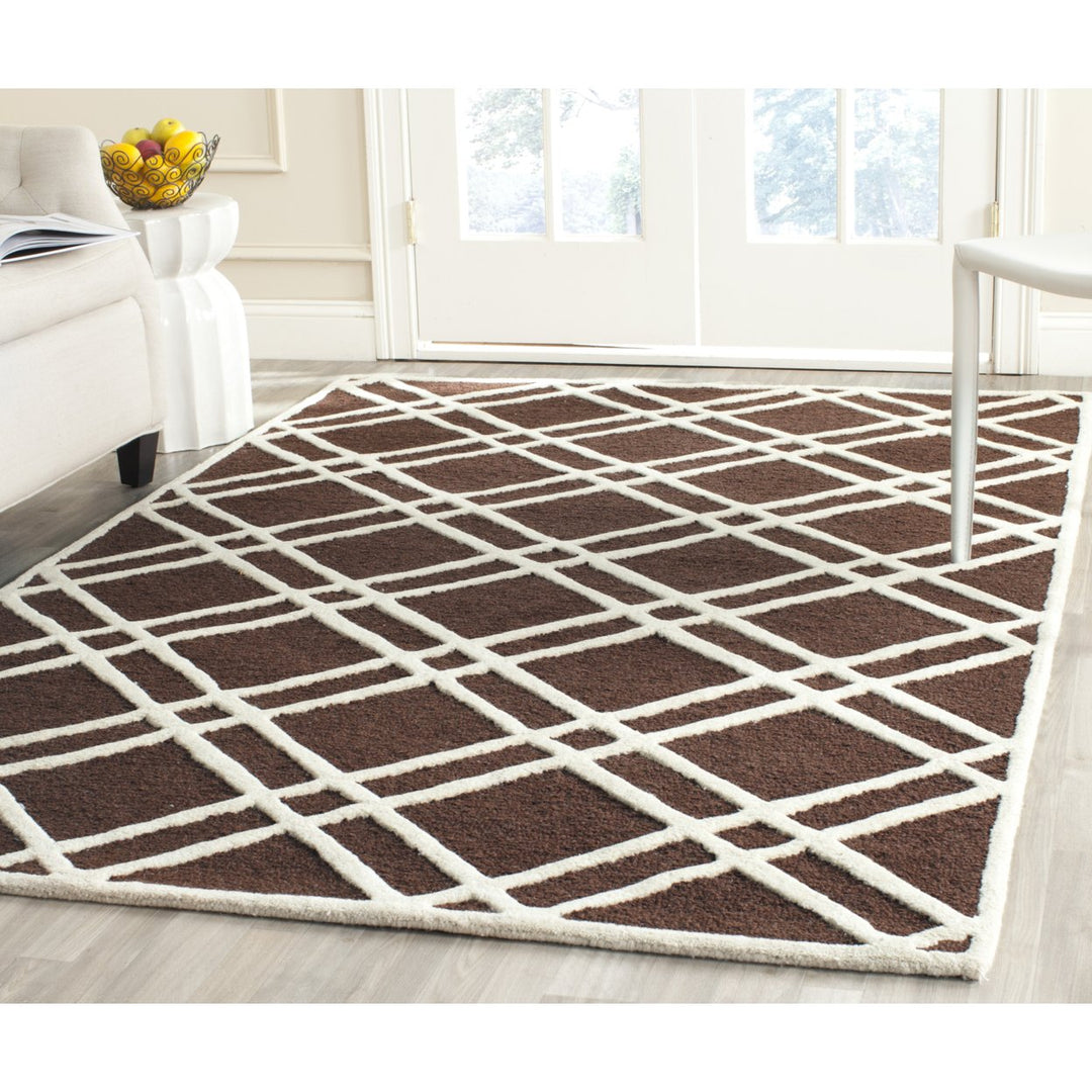 SAFAVIEH Cambridge CAM142H Dark Brown / Ivory Rug Image 1