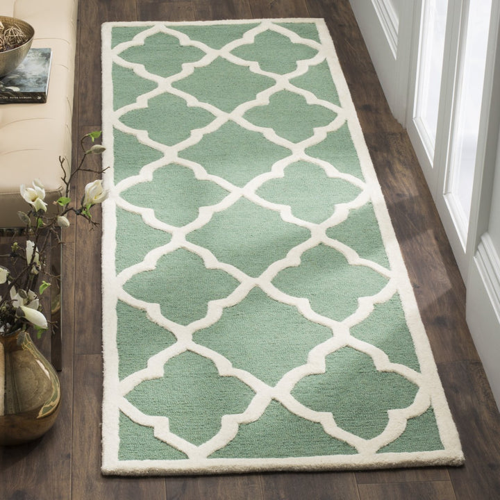 SAFAVIEH Cambridge CAM312T Handmade Teal / Ivory Rug Image 3