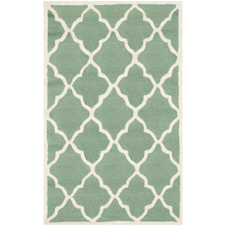 SAFAVIEH Cambridge CAM312T Handmade Teal / Ivory Rug Image 1