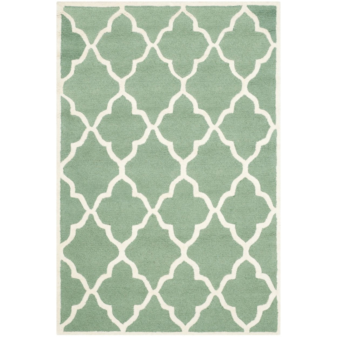 SAFAVIEH Cambridge CAM312T Handmade Teal / Ivory Rug Image 1