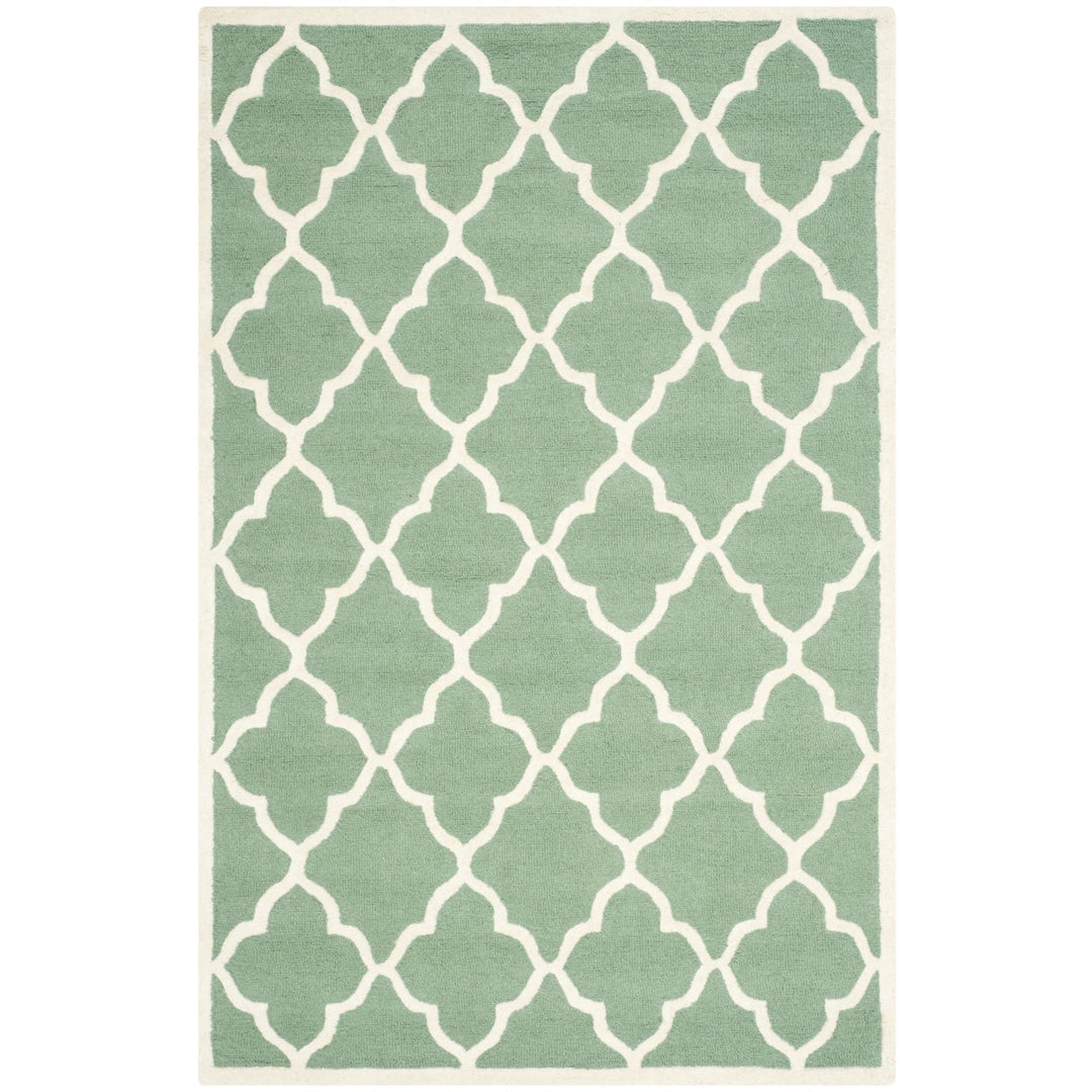 SAFAVIEH Cambridge CAM312T Handmade Teal / Ivory Rug Image 1