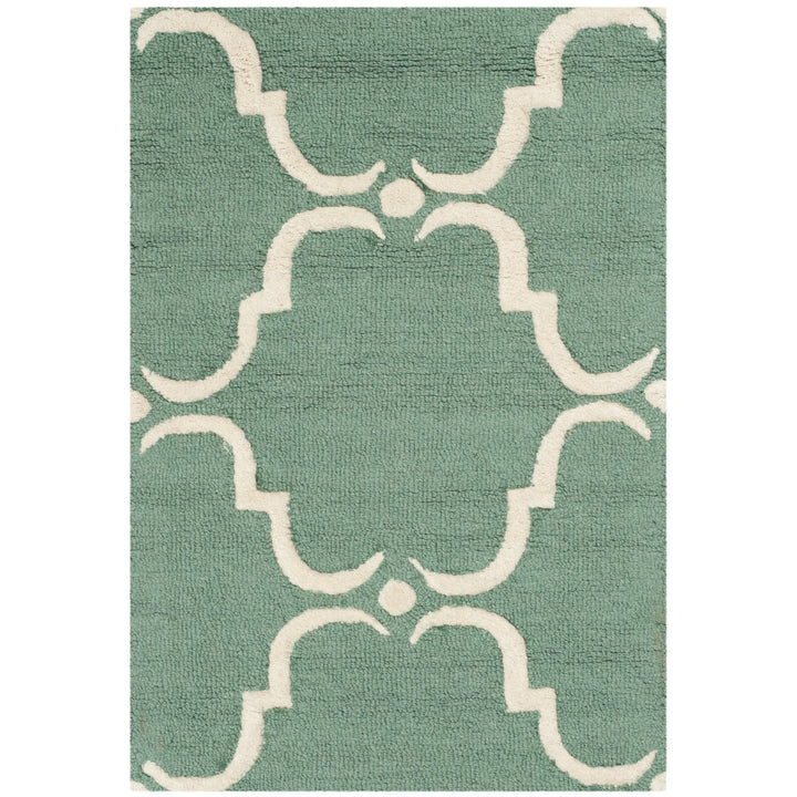 SAFAVIEH Cambridge CAM703T Handmade Teal / Ivory Rug Image 1