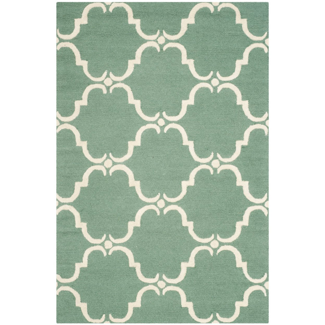 SAFAVIEH Cambridge CAM703T Handmade Teal / Ivory Rug Image 1