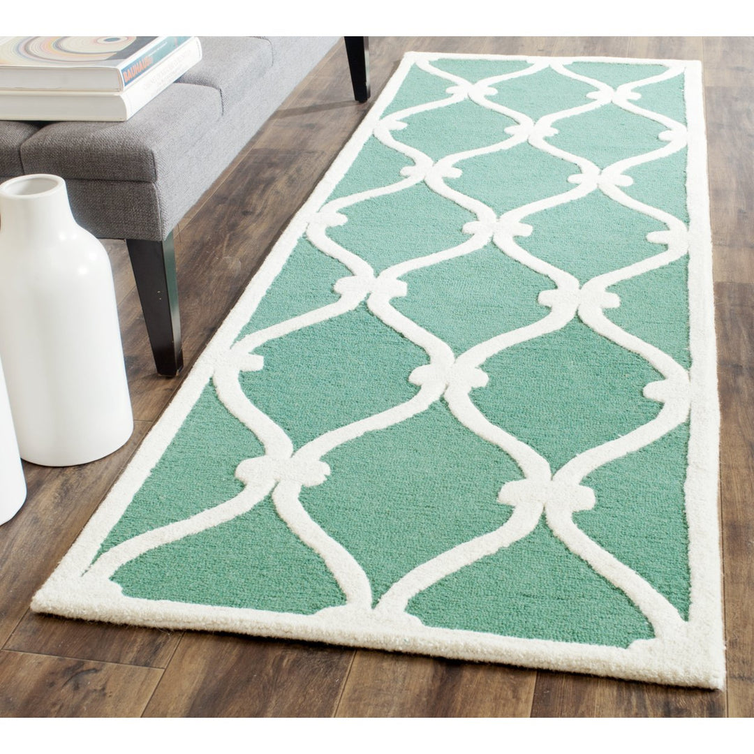 SAFAVIEH Cambridge CAM710T Handmade Teal / Ivory Rug Image 3