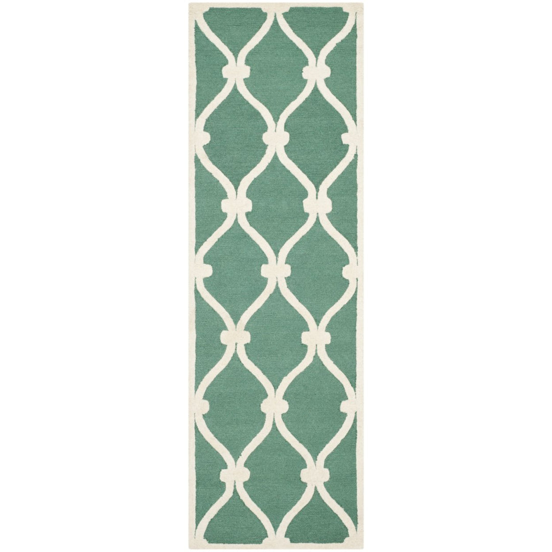 SAFAVIEH Cambridge CAM710T Handmade Teal / Ivory Rug Image 1