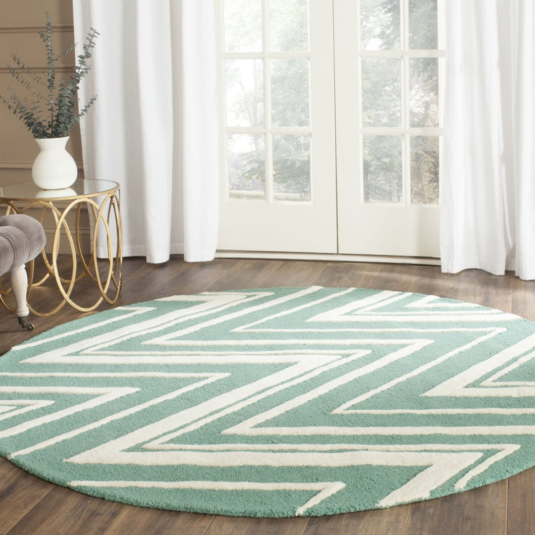 SAFAVIEH Cambridge CAM711T Handmade Teal / Ivory Rug Image 2