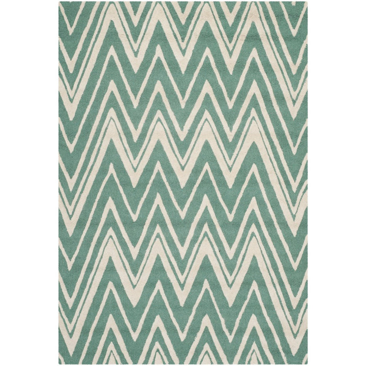 SAFAVIEH Cambridge CAM711T Handmade Teal / Ivory Rug Image 1