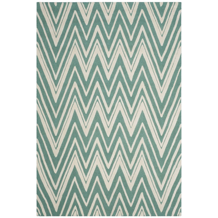 SAFAVIEH Cambridge CAM711T Handmade Teal / Ivory Rug Image 1