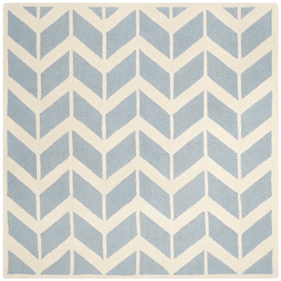 SAFAVIEH Cambridge CAM718B Handmade Blue / Ivory Rug Image 1