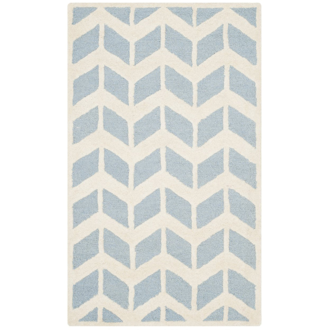 SAFAVIEH Cambridge CAM718B Handmade Blue / Ivory Rug Image 1