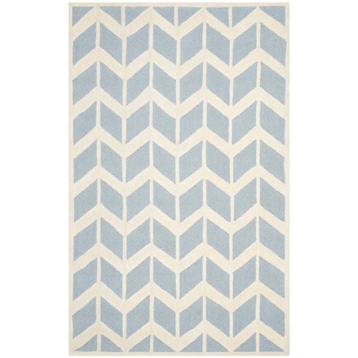 SAFAVIEH Cambridge CAM718B Handmade Blue / Ivory Rug Image 1