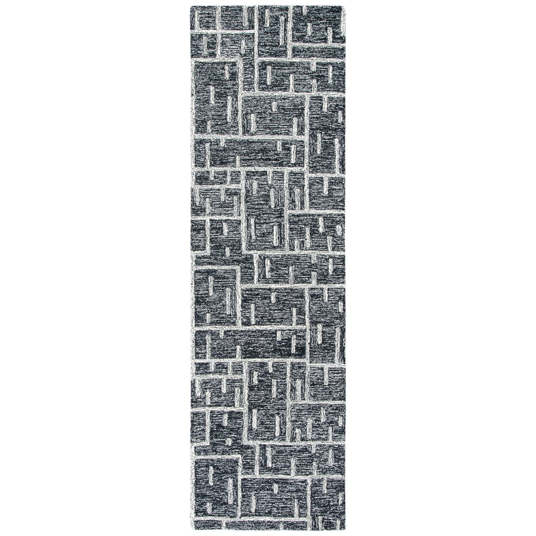 SAFAVIEH Cambridge CAM733Z Handmade Black / Ivory Rug Image 1