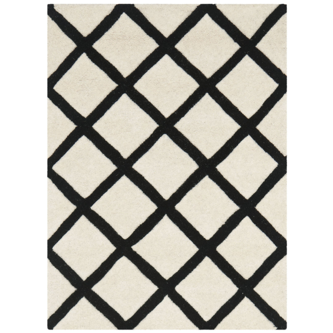 SAFAVIEH Chatham CHT718A Handmade Ivory / Black Rug Image 1