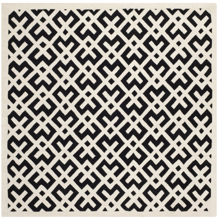 SAFAVIEH Chatham CHT719K Handmade Black / Ivory Rug Image 1