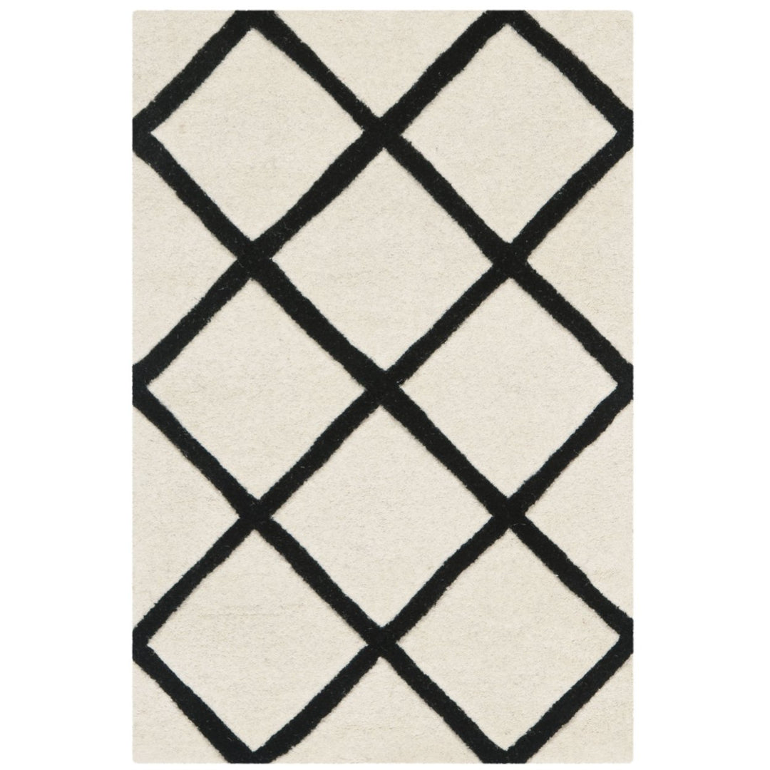 SAFAVIEH Chatham CHT720A Handmade Ivory / Black Rug Image 1