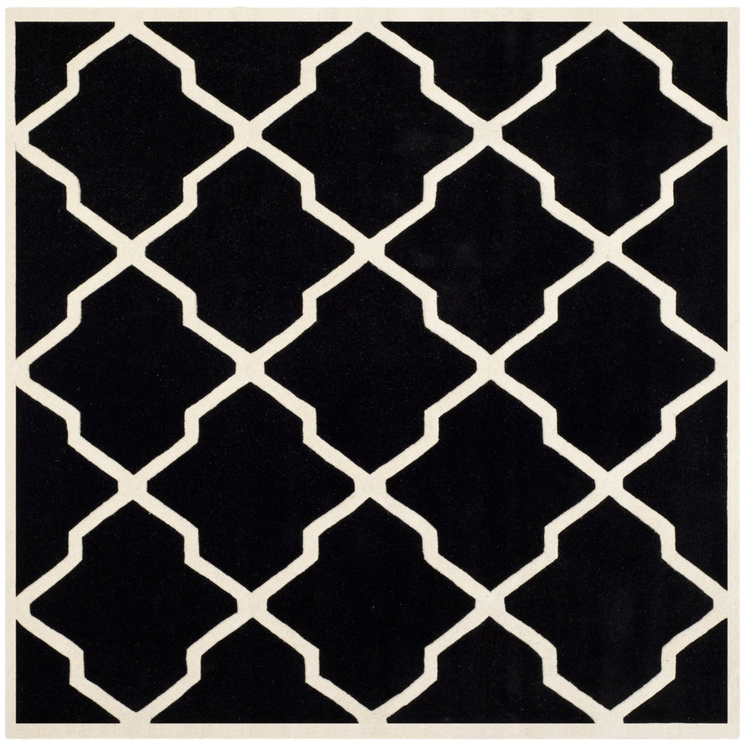 SAFAVIEH Chatham CHT735K Handmade Black / Ivory Rug Image 1