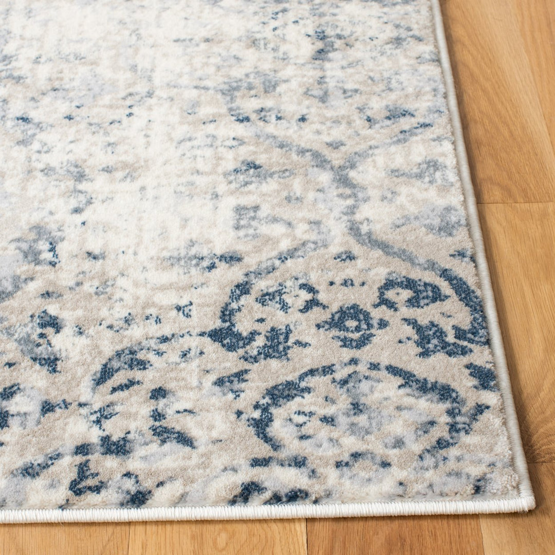 SAFAVIEH Carnegie Collection CNG681N Ivory / Navy Rug Image 3