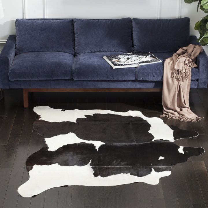 SAFAVIEH Cow Hide COH211B Black / White Rug Image 1