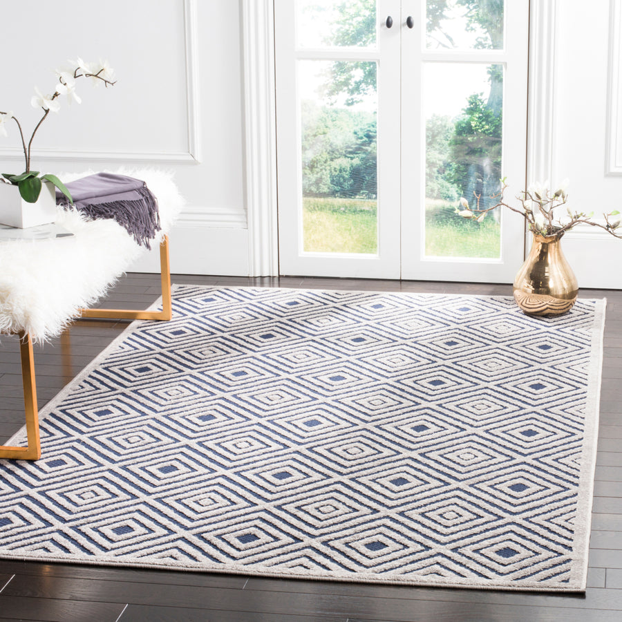 SAFAVIEH Cottage Collection COT913A Cream / Navy Rug Image 1