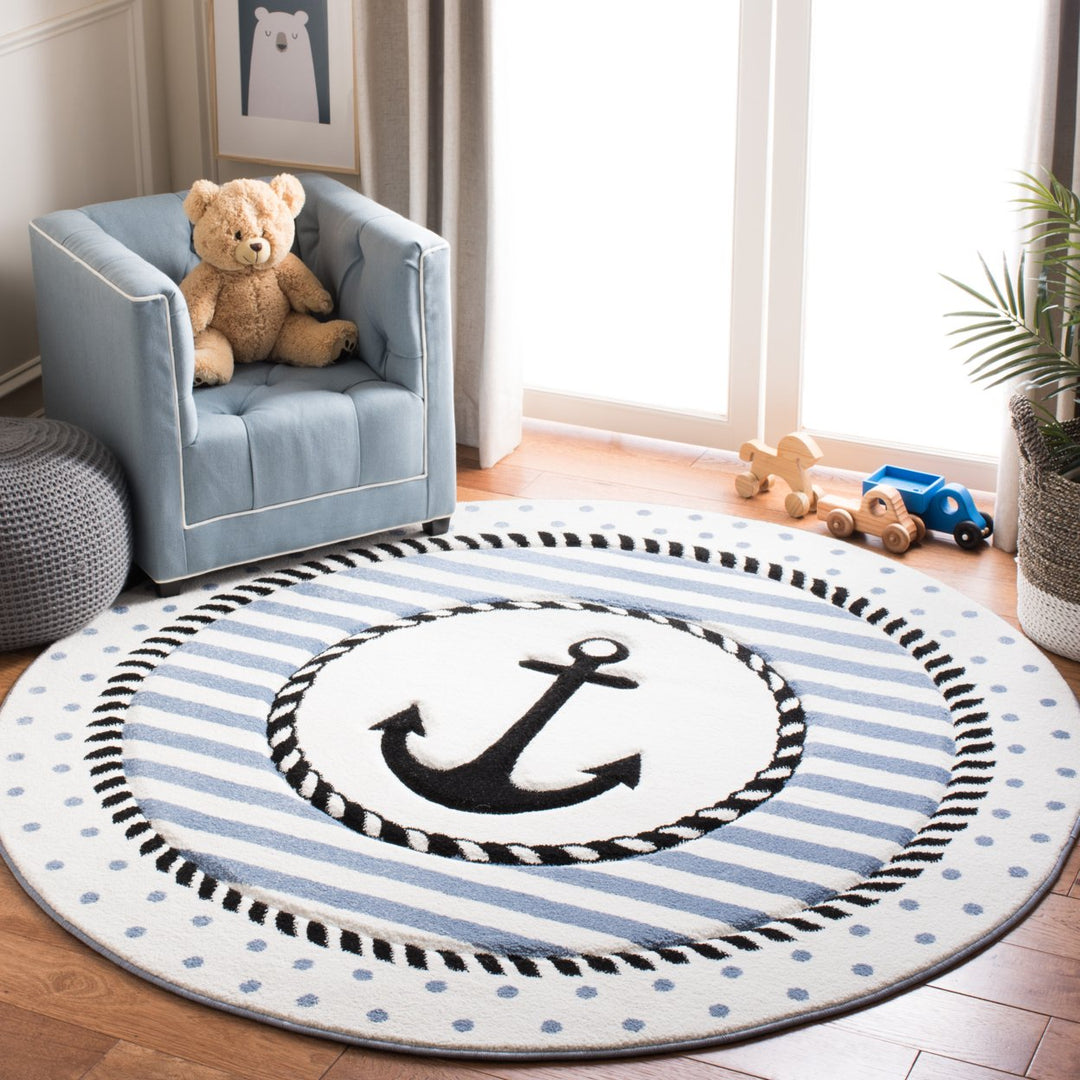 SAFAVIEH Carousel Kids Collection CRK124A Ivory/Navy Rug Image 9