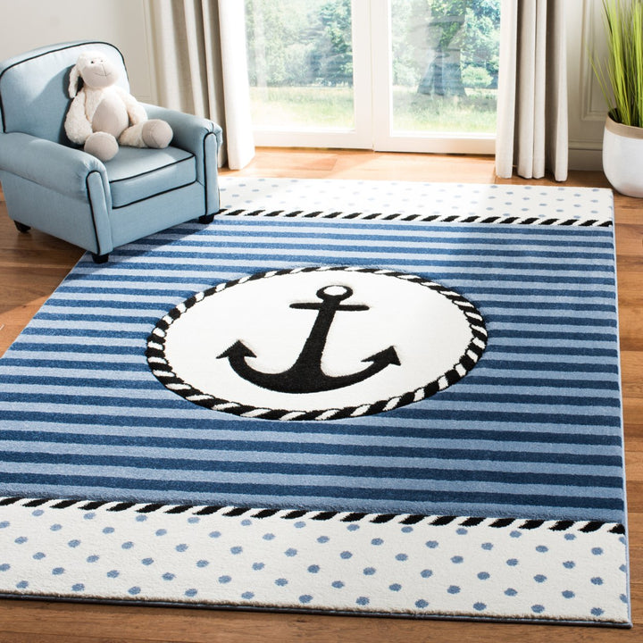 SAFAVIEH Carousel Kids Collection CRK124N Navy/Ivory Rug Image 1