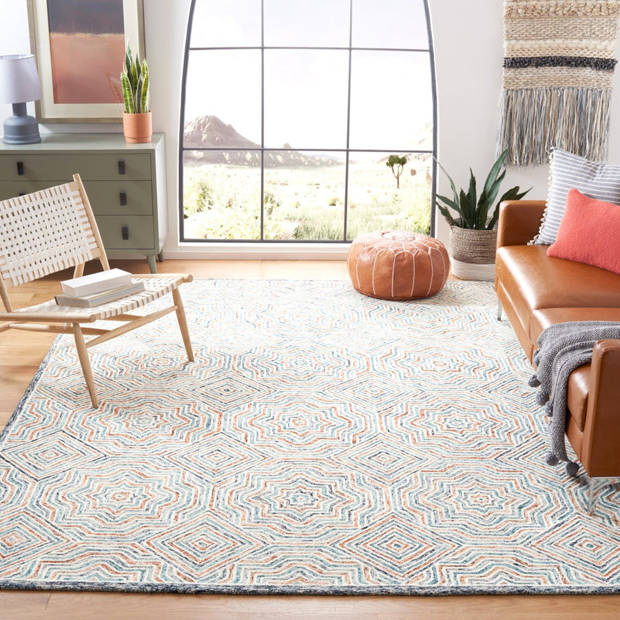 SAFAVIEH Capri Collection CPR215M Handmade Blue/Rust Rug Image 1