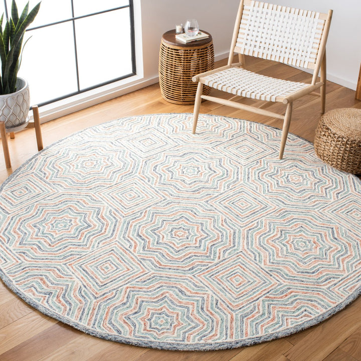 SAFAVIEH Capri Collection CPR215M Handmade Blue/Rust Rug Image 2