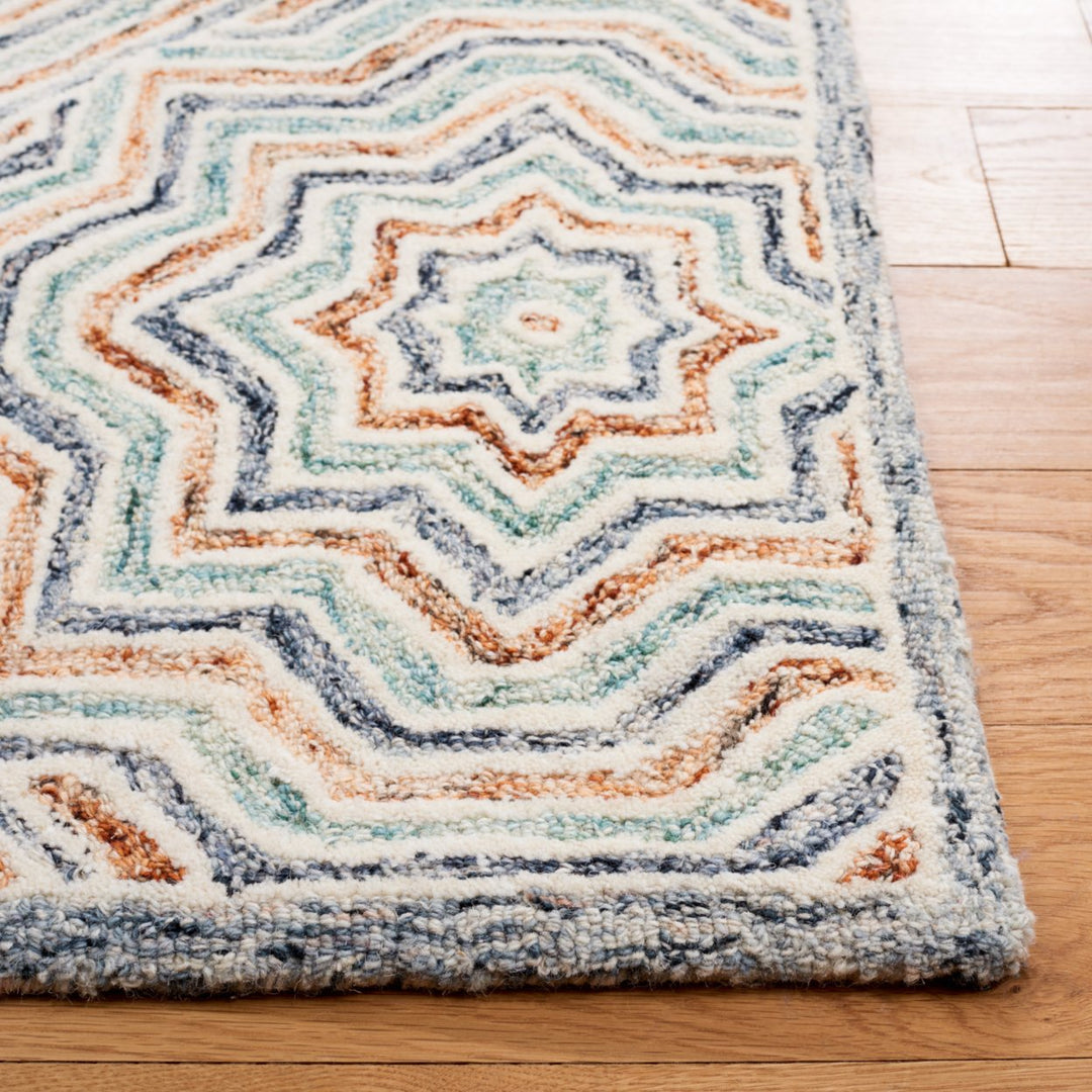 SAFAVIEH Capri Collection CPR215M Handmade Blue/Rust Rug Image 7