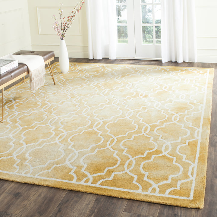 SAFAVIEH Dip Dye DDY539H Handmade Gold / Ivory Rug Image 1