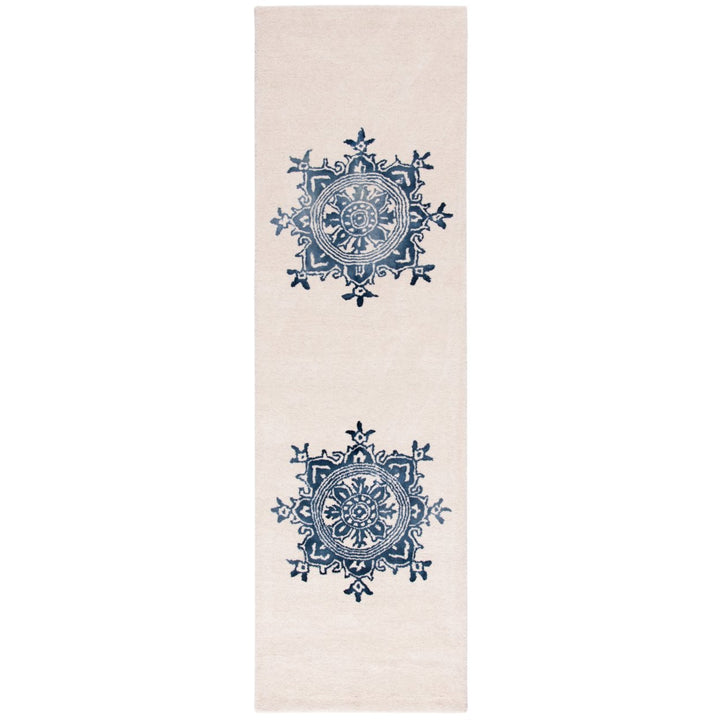 SAFAVIEH Dip Dye DDY701M Handmade Ivory / Blue Rug Image 1