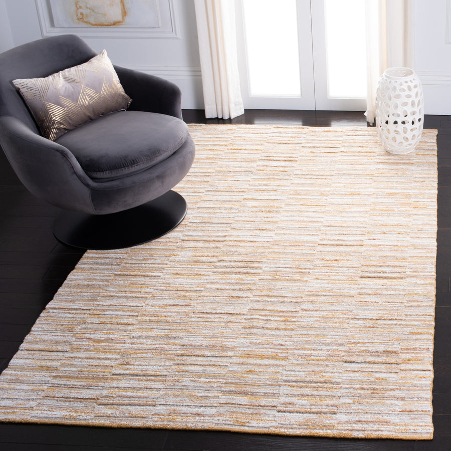 SAFAVIEH Elements Collection ELM202D Handmade Gold Rug Image 1