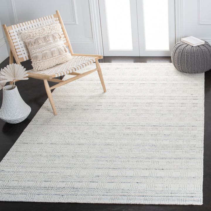 SAFAVIEH Elements ELM301A Handmade Ivory / Grey Rug Image 1