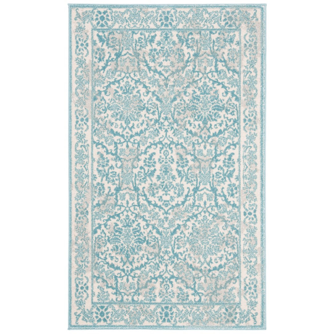 SAFAVIEH Evoke Collection EVK242C Ivory / Light Blue Rug Image 1